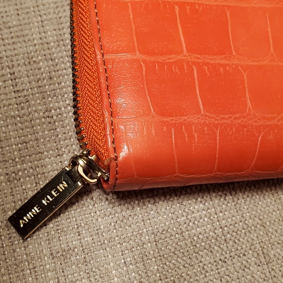 Anne Klein zippered wallet, orange with gold zippers and embellishment lock. - Picture 6 of 15